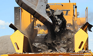 Recycled asphalt shingles from Asphalt Shingle Grinding.